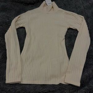Women’s x-small turtle neck. Brand new.